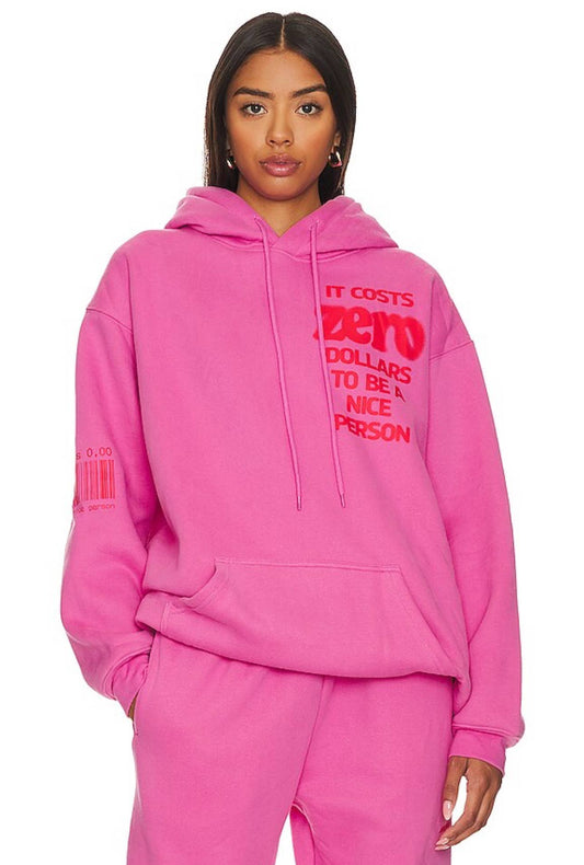 pink hoodie with "It costs zero dollars to be a nice person" and matching pink pants