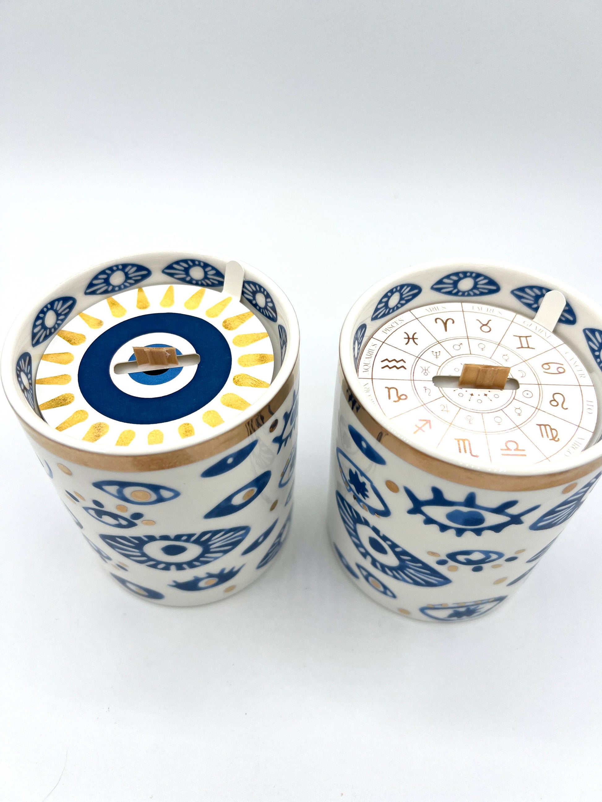 Two decorative items with blue and white patterns on a white background